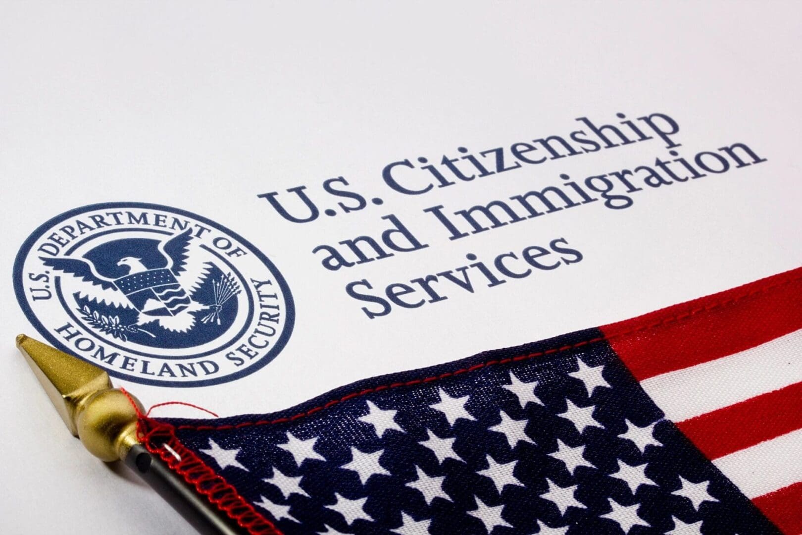 U.S. Citizenship and Immigration Services document with American flag.