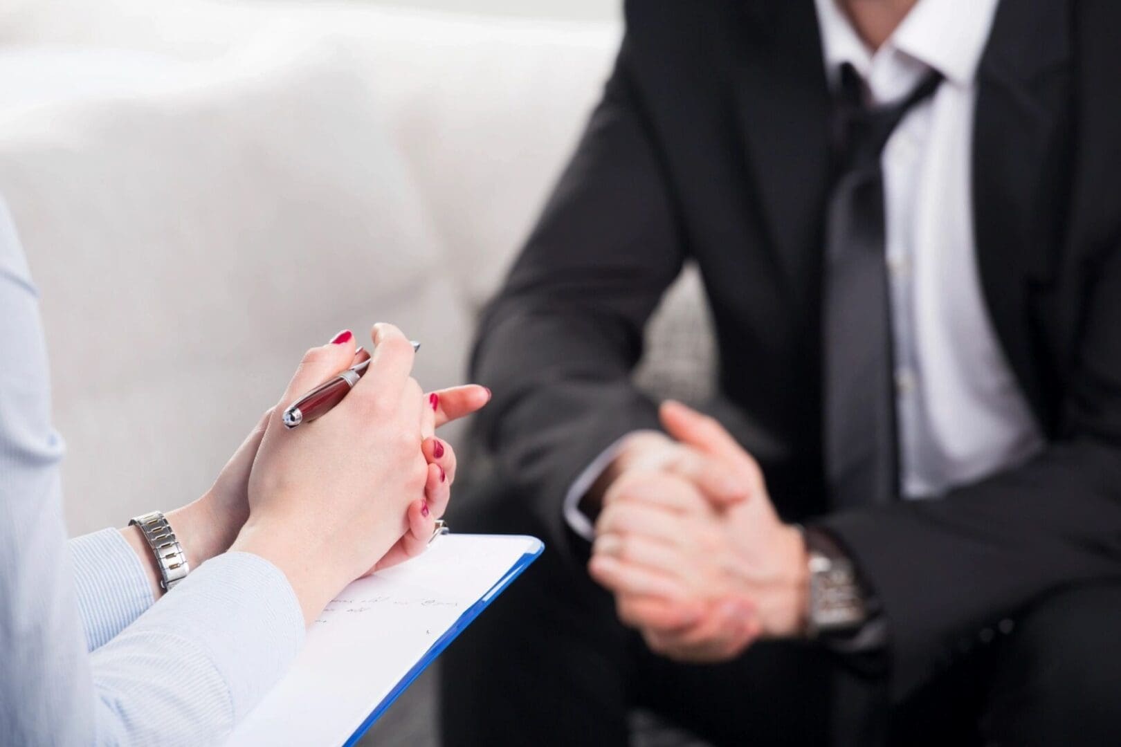 A professional therapy session with a patient and therapist.